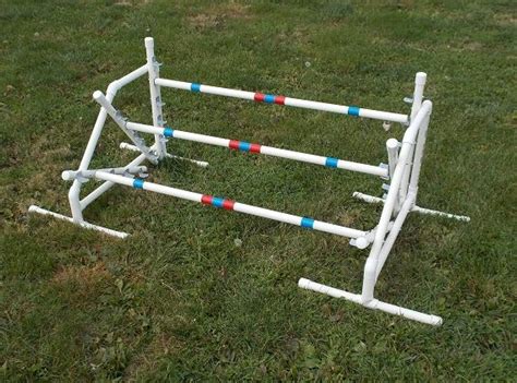 The kit contains<b> an adjustable jump, weave poles, a tire jump, tunnel, and pause box. . Akc agility equipment specifications